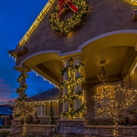 home at evening with lights and wreath