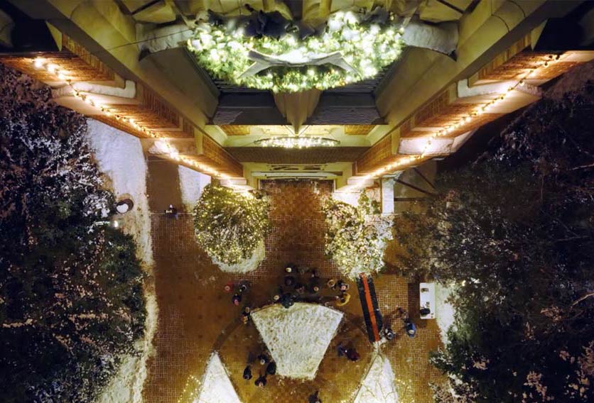 view from top of tower with lights and wreath